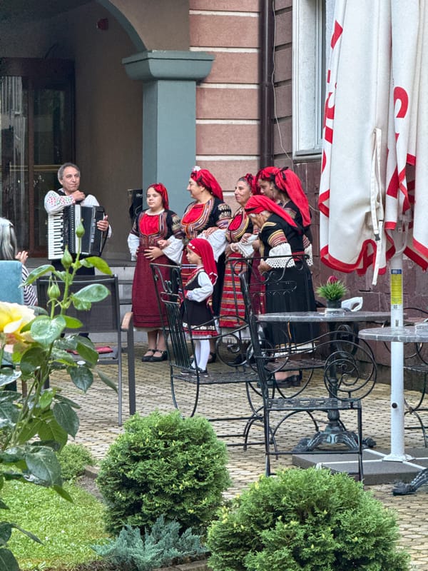 Folk musicians perform in traditional costumes in Kyustendil, Bulgaria