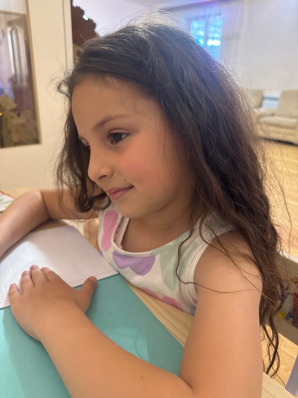 Young girl observed indoors with inquisitive expression
