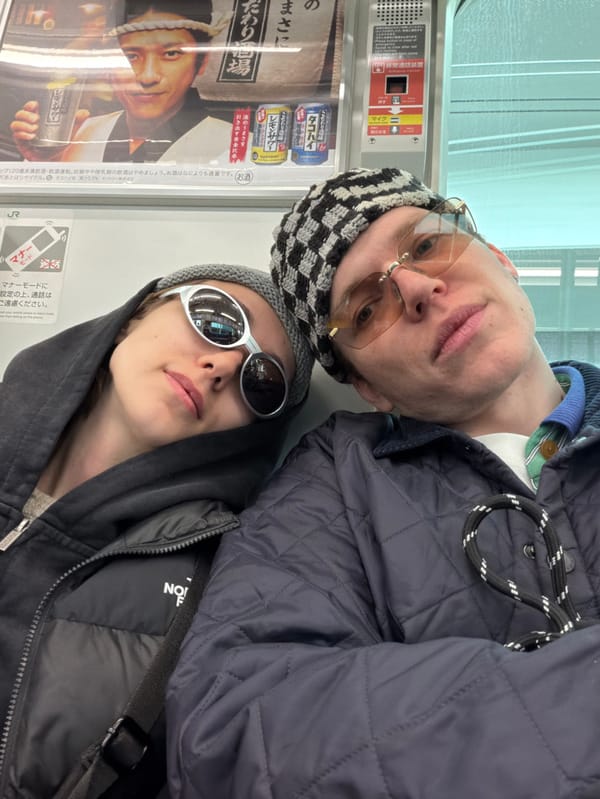 Late-night train passengers observed in Tokyo's Shinagawa district