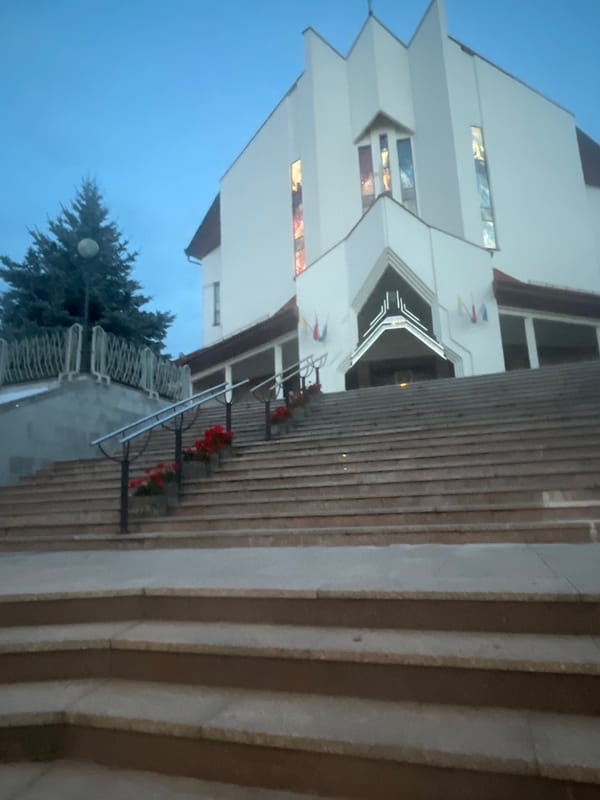 Białystok at dusk: churches, park paths, and city lights