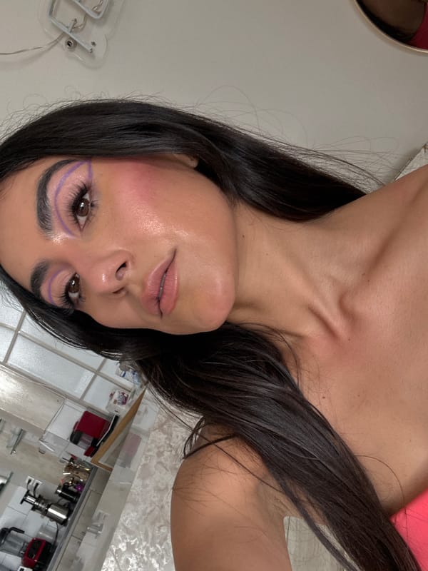 Woman takes selfies indoors in Puebla, Mexico