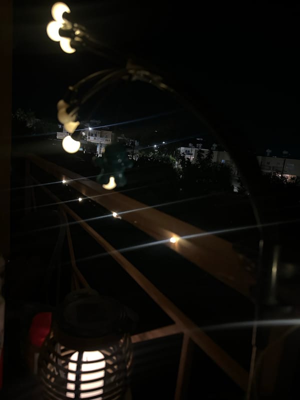 Balcony night in Peyia, Cyprus, with lights and decor