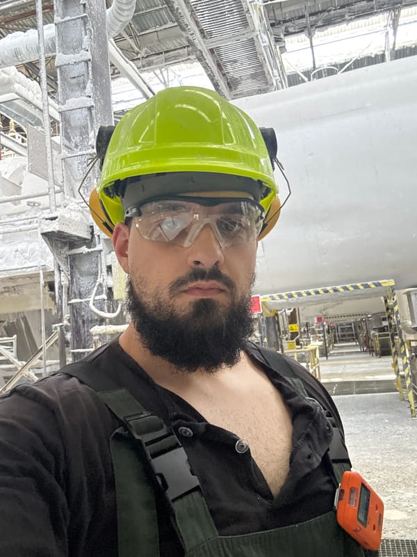 PPE-suited worker on the job in industrial Devnya, Bulgaria
