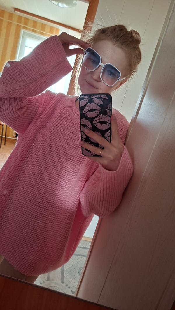 Woman takes mirror selfie in Большой Букор, Russia