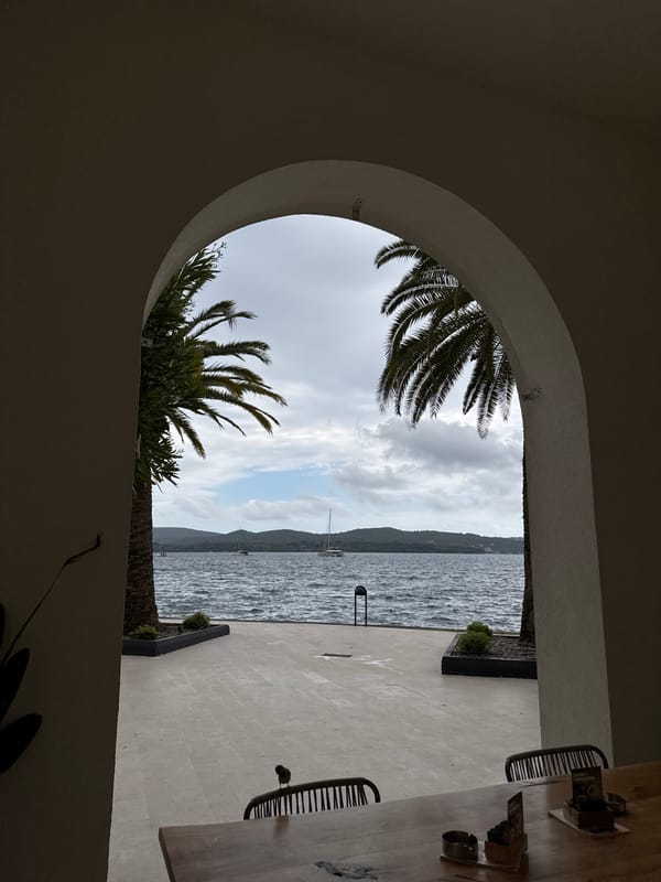 Bay of Kotor viewed through archway in Tivat, Montenegro