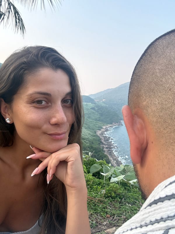 Woman takes selfies in coastal Đà Nẵng setting