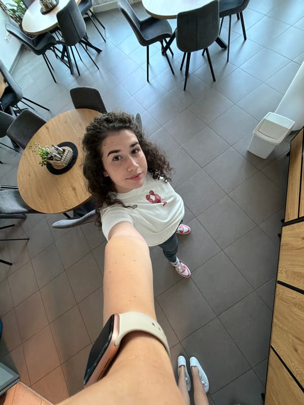 Selfie session in a Sofia office space, city views outside