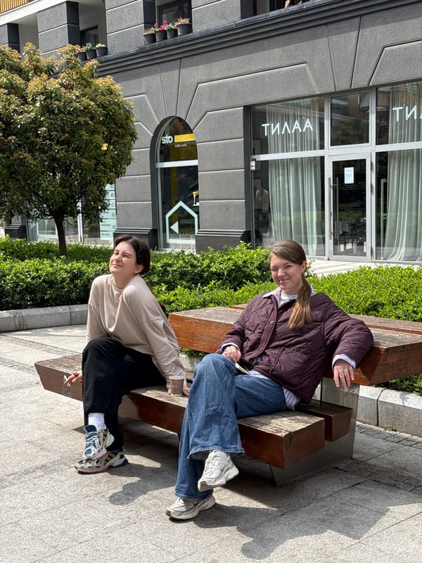 Children walk, cyclist rides on Belgrade sidewalks Friday morning