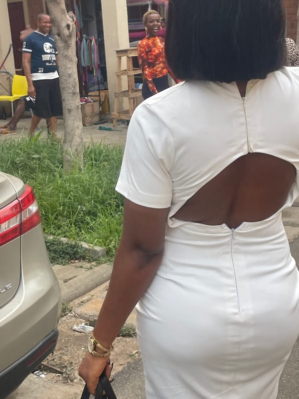 Photo session between two women in Abuja office setting