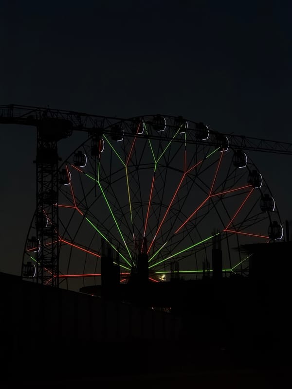 Evening scenes captured in Kazan: sunset and illuminated ferris wheel