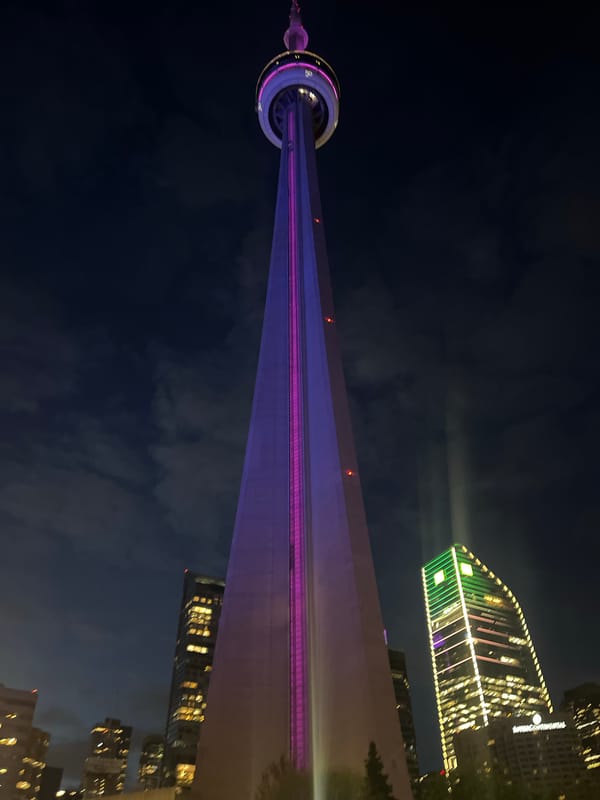 Purple CN Tower, FIFA signage spotted in nighttime Toronto