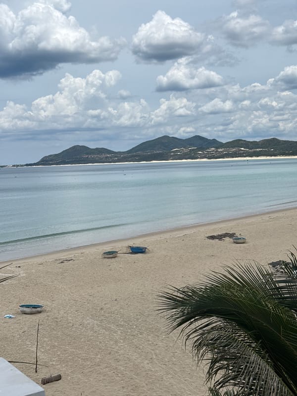 Calm tropical beach and balcony views on a cloudy day