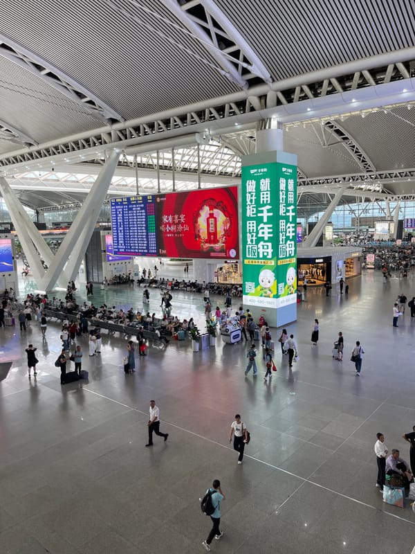 Inside Guangzhou South Station on a busy travel morning
