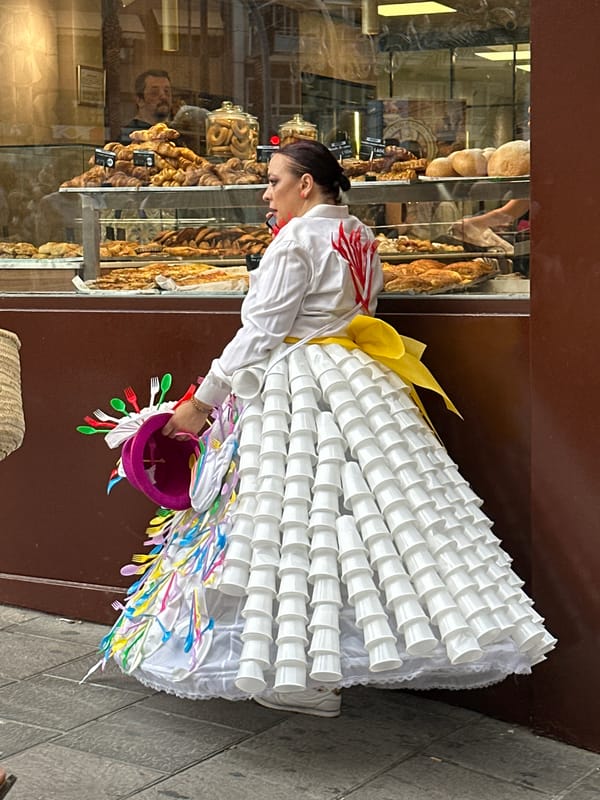Costumed street parade draws crowds in Alicante, Spain