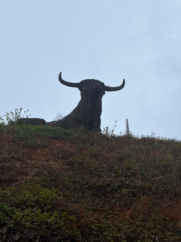 Bovine sculpture documented on vegetated mound in Rijswijk