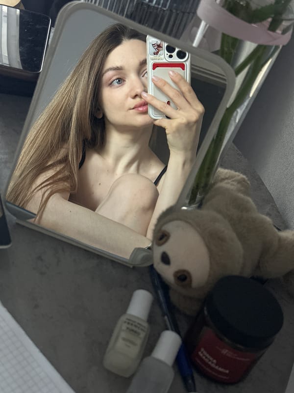 Woman Takes Mirror Selfie in Kazan, Russia