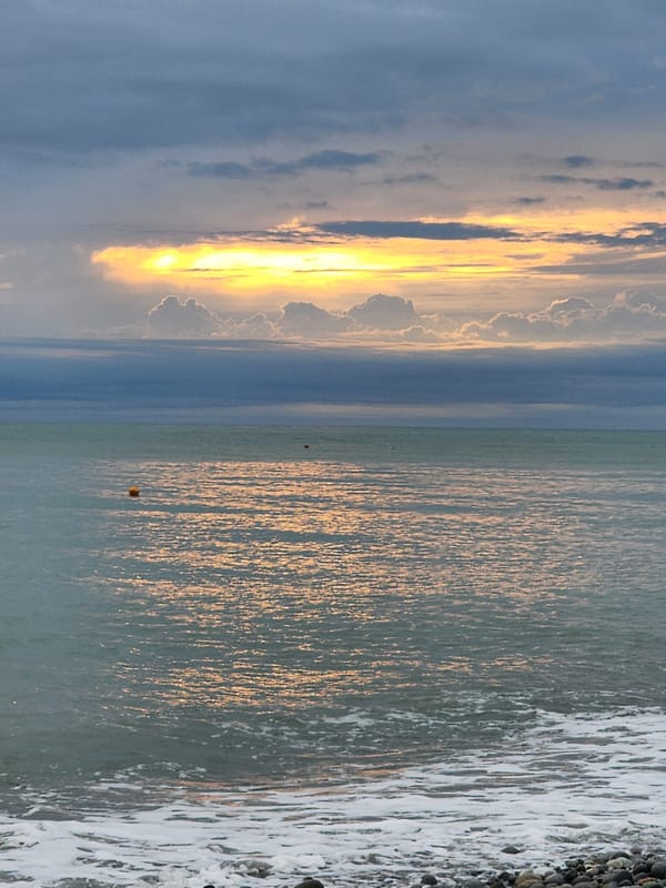 Evening beach scenes documented along Sochi's Black Sea coastline