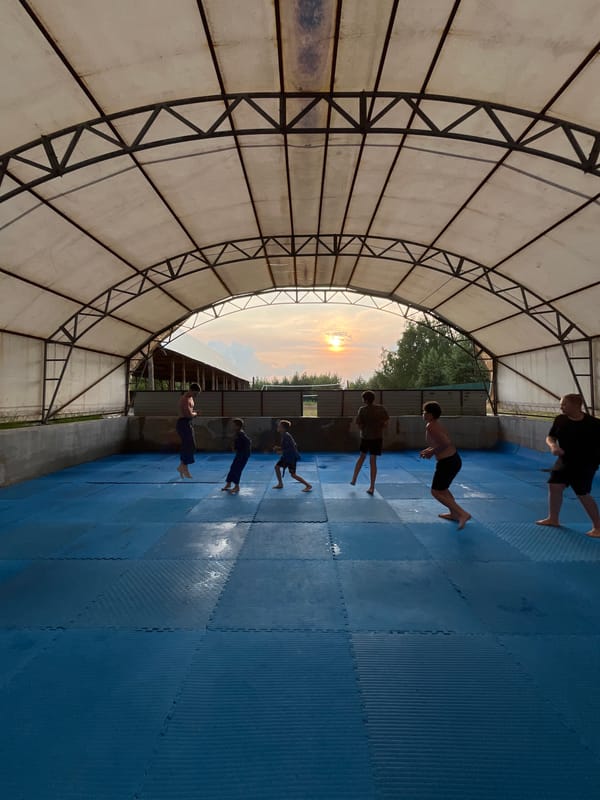 Outdoor martial arts training under a canopy in Krasnoturansk