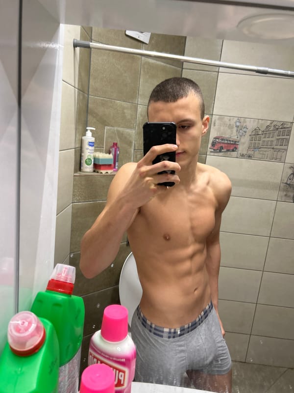 Man takes shirtless bathroom selfie in Burgas, Bulgaria