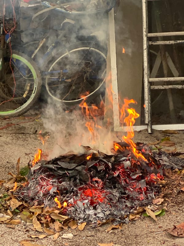 Leaf fire burns in Baan Kai, Thailand neighborhood