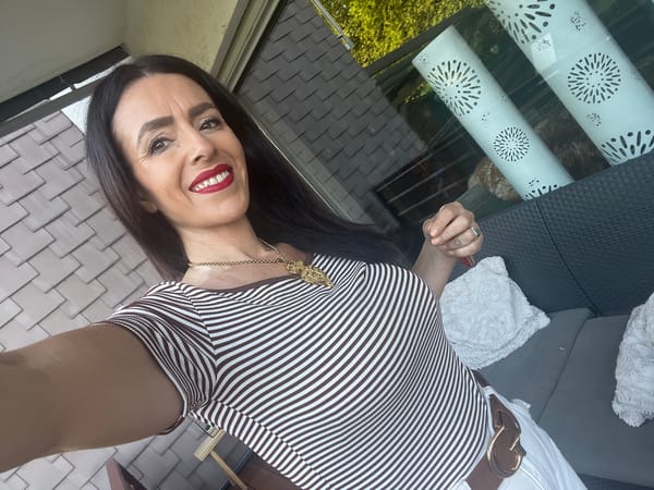 Woman takes selfies in early morning hours in Konz