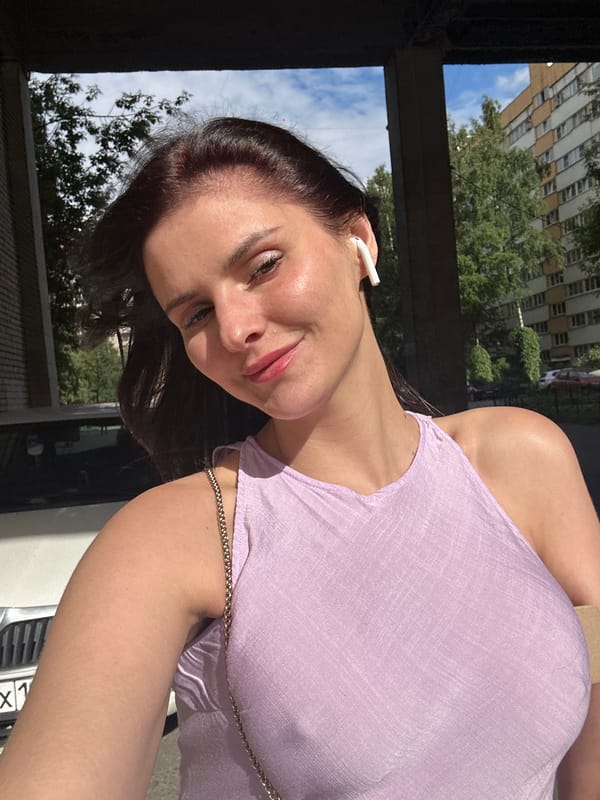 Sunny selfies outside a Saint Petersburg apartment block