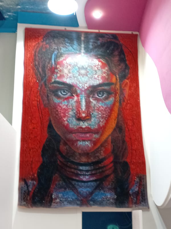 Mixed urban observations: portrait, luxury car, provocative cat artwork