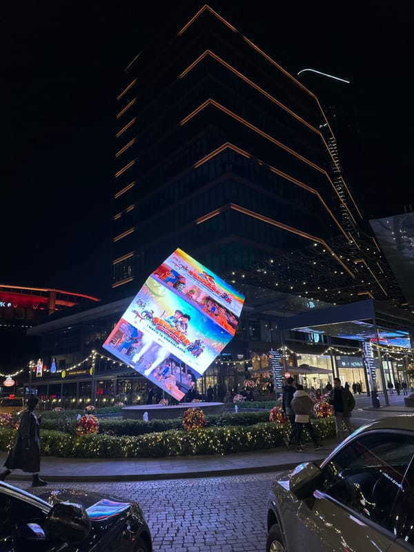 Animated film advertisement display illuminates Sarıyer district at night