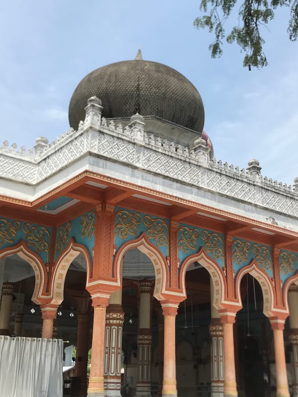 Ornate mosque photographed from multiple angles in Palohgadeng, Indonesia