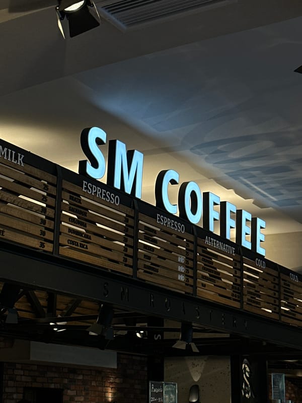 Coffee shop sign spotted in Chișinău displaying menu options