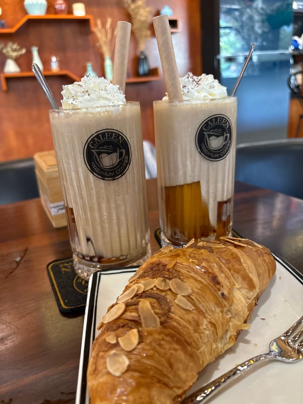 Iced coffee and pastries at a Nha Trang café