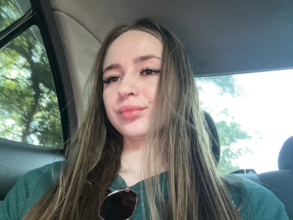 Back seat selfie series in a teal top