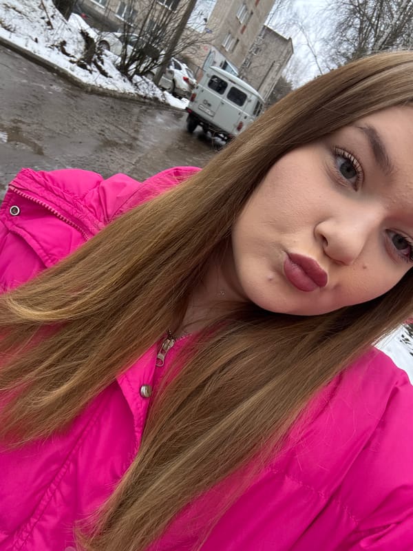 Woman takes winter selfies with dog in Chaikovsky