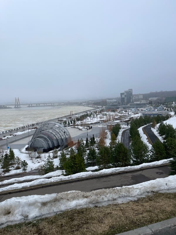 Foggy winter scene documented along frozen Kazanka River in Kazan