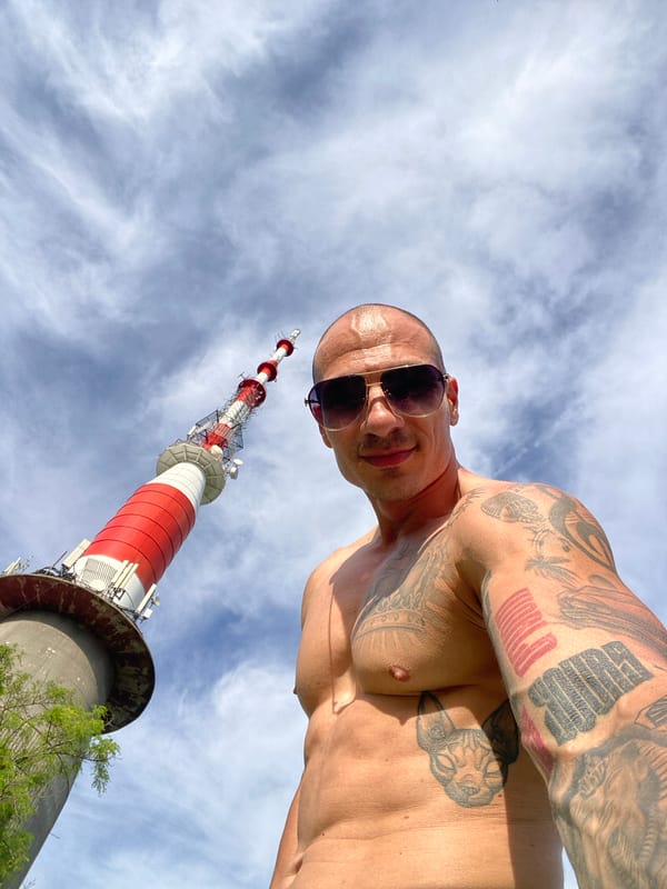Couple photographs themselves near Pleven TV tower during afternoon outing