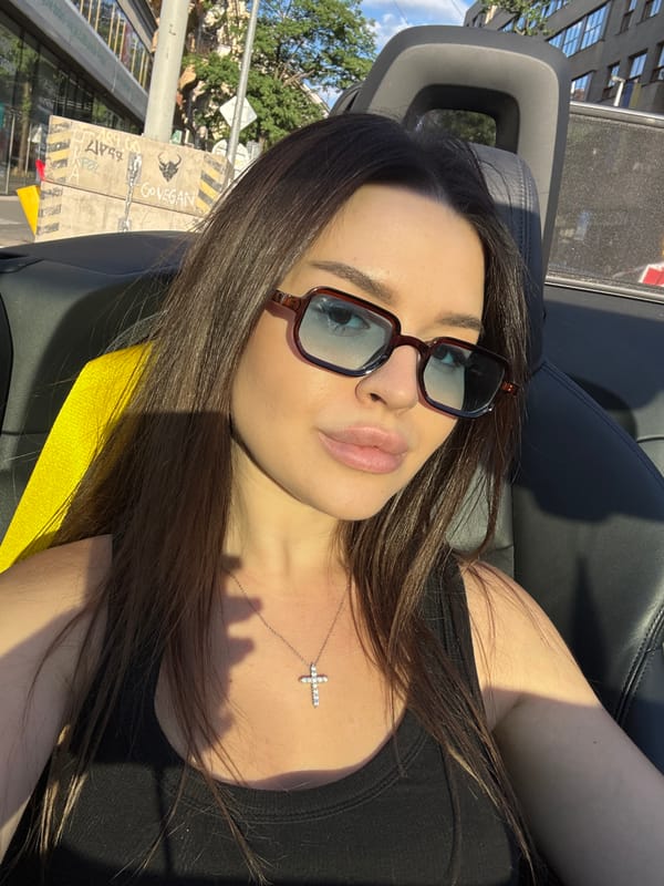 Sunny convertible moment cruising through Prague