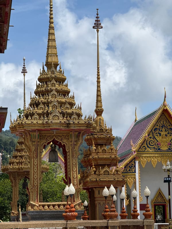Exploring Wat Chalong's gilded temple grounds and paths