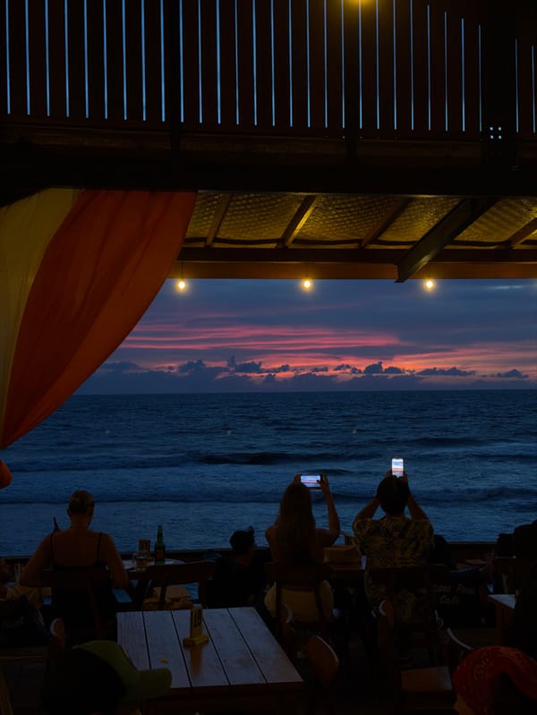 Musical trio performs at Bali beachfront venues during evening