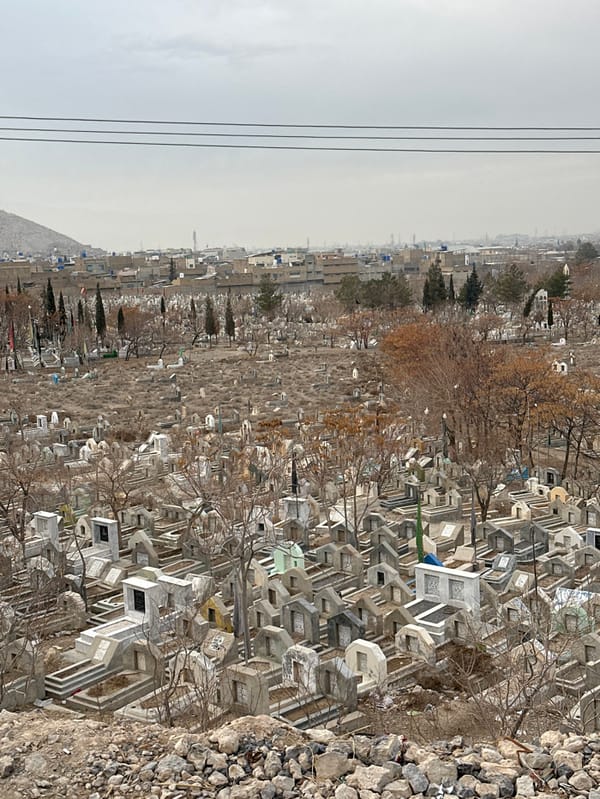 Visitors gather on rocky overlooks above Quetta city