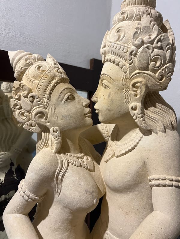Stone statues documented in indoor Ubud location
