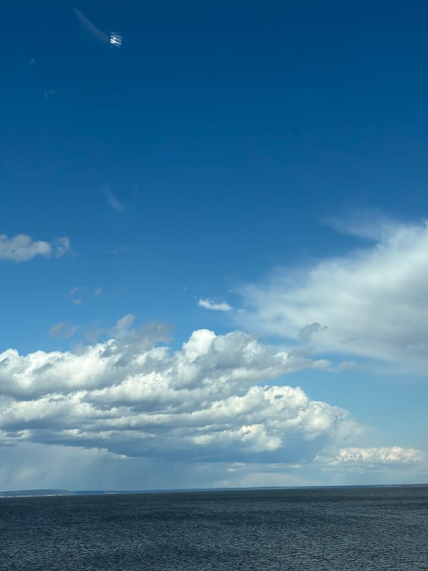 Dramatic sky over water body captured in Chaikovsky, Russia