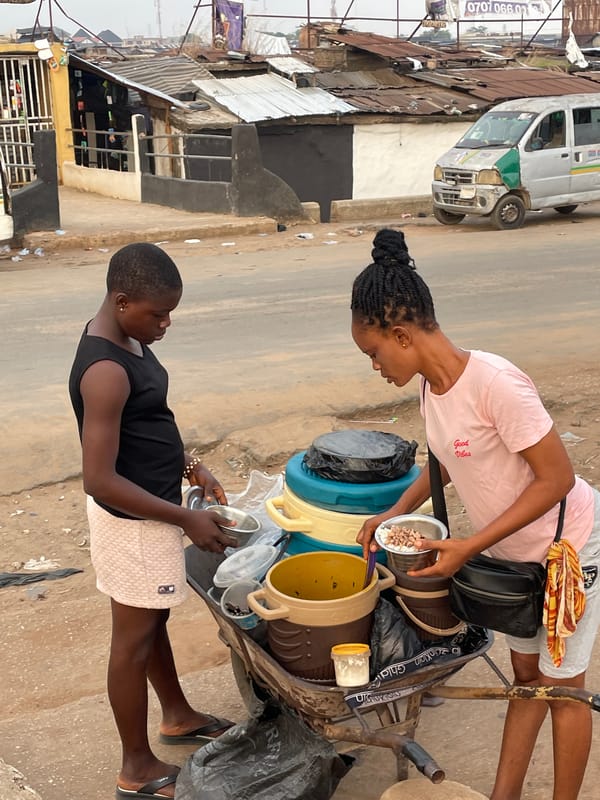 Two women with cart observed on Onitsha street