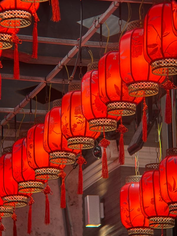 Nha Trang streets at night: lanterns, flowers, and lit-up stalls