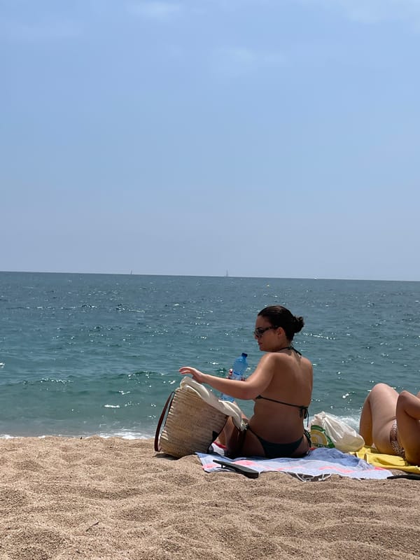 Lazy midsummer afternoon on a Catalan beach