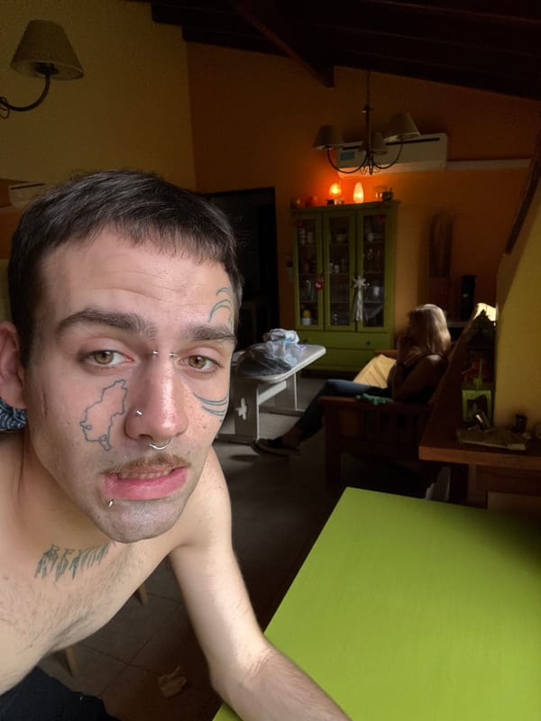 Person with facial tattoos and piercings photographed in Argentina