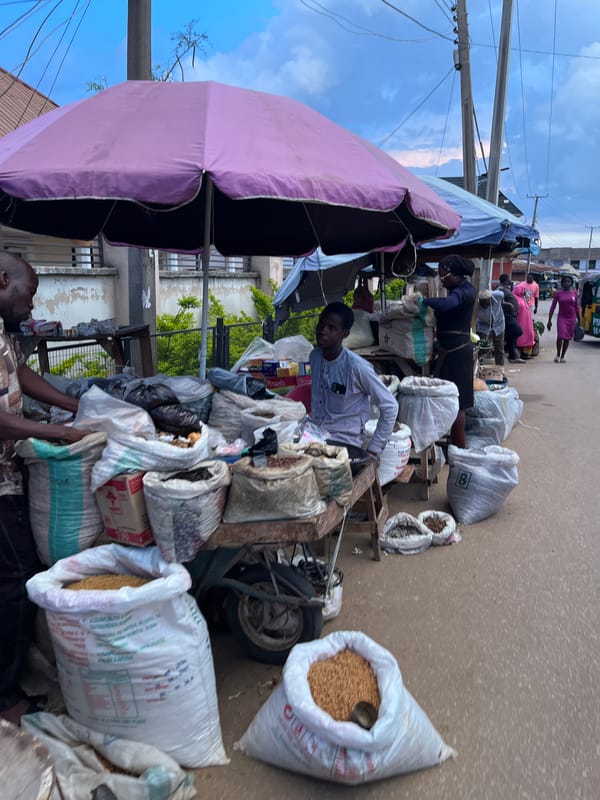 Street Market Bustles With Vendors and Shoppers