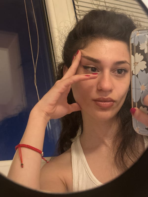 Woman Takes Multiple Mirror Selfies in Sofia Apartment