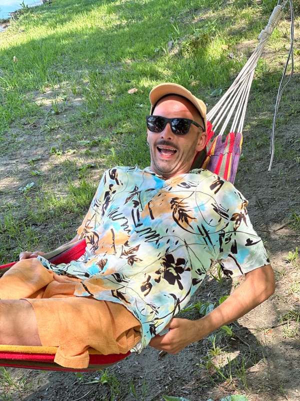 Man enjoys morning leisure time in waterfront Vranjina, Montenegro