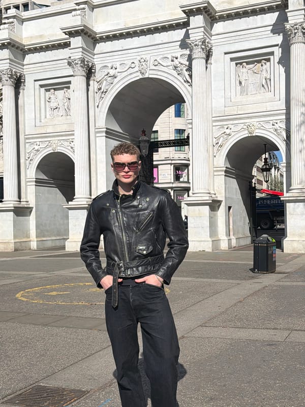 Young man photographed at London's Marble Arch crossing