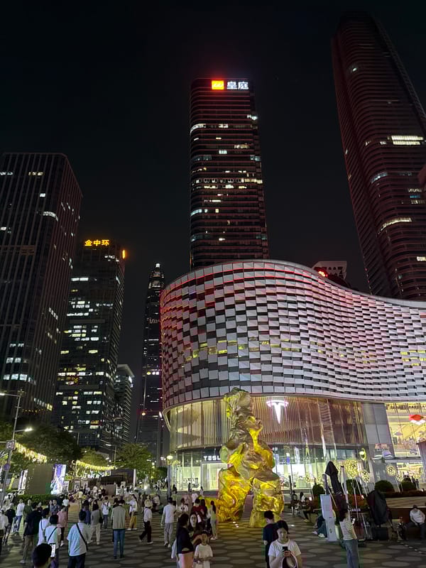 Orange Bentley SUV spotted on Futian District walkway